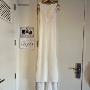 Simple white wedding dress with bateau neckline